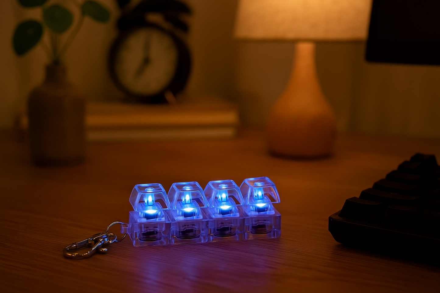 Clixy - Llavero anti-estrés 4 teclas con luces LED transparente